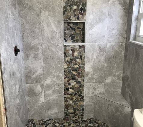Rk marble tile inc - riverview, FL. 12x24 vertical stacked