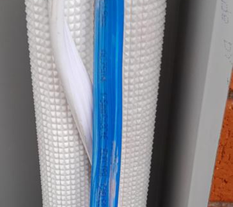 Valley Air Conditioning - Thornton, NSW. Scraped wiring by pulling through serrated brick. Other wired had bulges and cuts in insulation. All electrical work was carried out by unqualified electricians (except at power box)