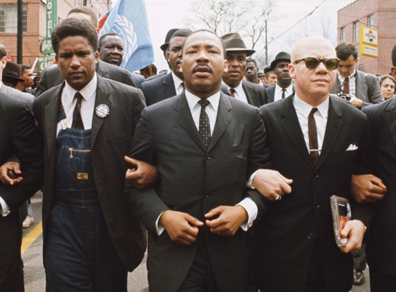 Round House Mfg - Shawnee, OK. Is this man standing to the left of MLK wearing Roundhouse jeans?