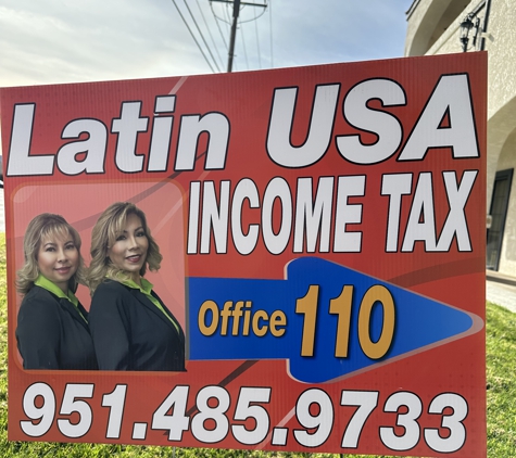 Latin USA Income tax - Moreno Valley, CA. Our Yard Signs in front of our Office Entrance