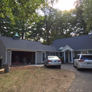 Elevate Management Group, LLC - W Hartford, CT. Full remodel of garage. Added 8ft to accommodate a mudroom between garage and home and also added roof over front door and redid whole roof.