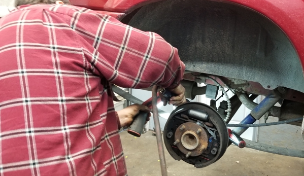 Schultz Garage - Petersburg, OH. Jeff repairing brakes!