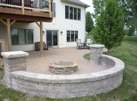 Appleton Lawn Snow Landscaping - Hortonville, WI. We LOVE sitting by the fire. If only we could do something about the pesky bugs!