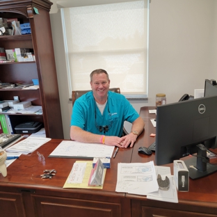 Anderson Family Dentist - Findlay, OH. Findlay dentist Dr. Bill Anderson in his consulting room at Anderson Family Dentist