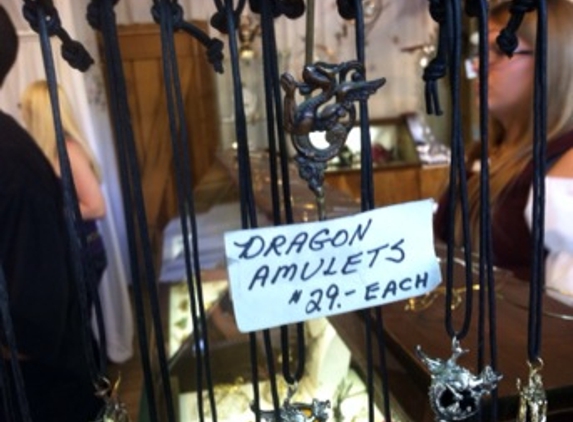Maryland Renaissance Festival - Annapolis, MD. Dragon amulets at the Brass Dragon <3