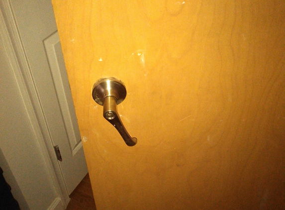 Pollard & Bagby Inc - Richmond, VA. Doorknob after the break-in. No deadbolt in sight. Took days for maintenance to fix