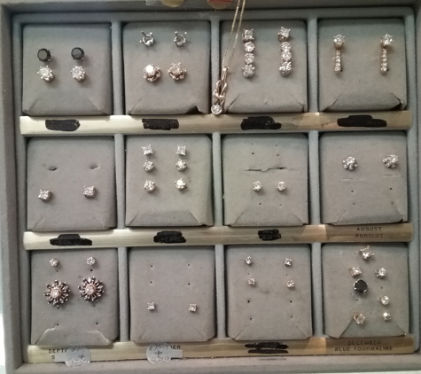 Ingavo's Gold & Diamond Outlet - Johnstown, PA. Diamond Stud Earrings & Jackets.