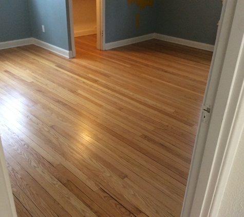 Nelson Flooring - Madison, WI. Bedroom hardwood floor refinishing.