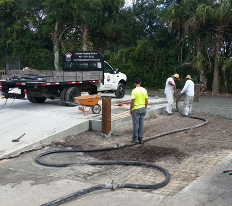 Concrete Pumping Enterprises - Orlando, FL. Pumping an extension to my shop