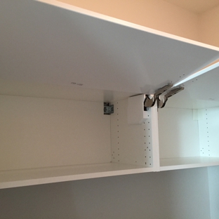 C.C.Assembly Services - Austin, TX. Laundry room installation of ikea overhead cabinets.