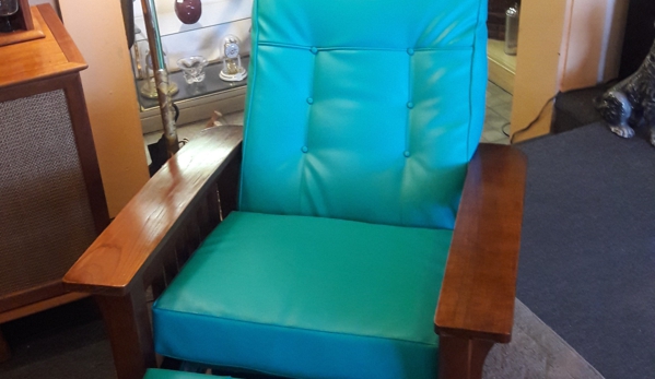 Classic House - Phoenix, AZ. Newly custom reupholstered in a Turquoise Promo vinyl fabric. Placed on our showroom floor for purchase.
