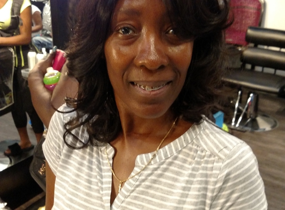 A Touch Of Te'Hair Studio - Baltimore, MD. A carefree sew-in weave