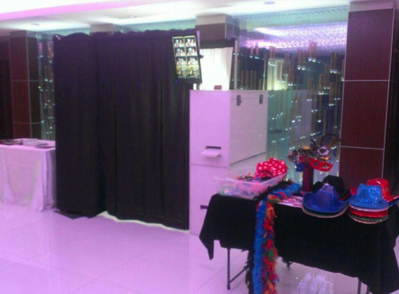 Crimson Photo Booth - Montebello, CA. Full size Photo Booth with image reflection touch screen & external monitor for real time slide show, props and privacy curtains.