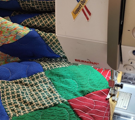 Teresa's Quilting Studio - Merryville, LA. Putting a binding on grandma's quilt top after quilting it on the longarm. She would be so happy to of seen it finished.