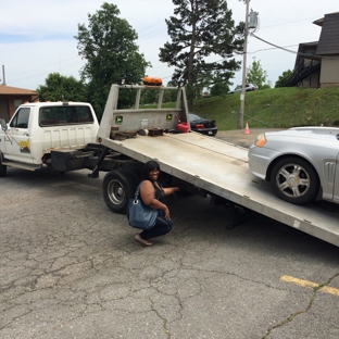 Phoenix Towing - Little Rock, AR. Some times customers want to experience the felling of operating a tow truck, I just let them help, why not, LOL