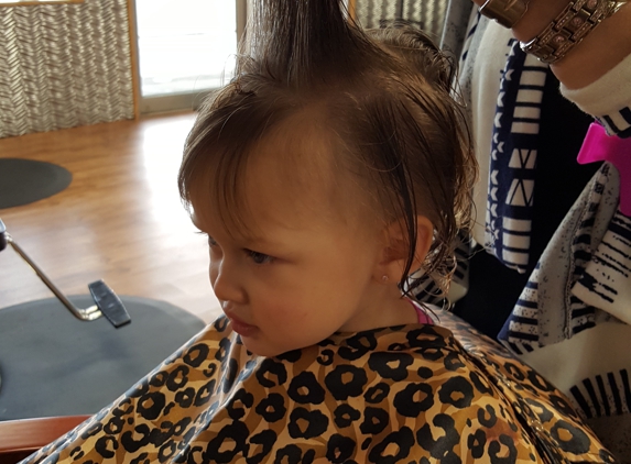 Luxury Salon - Steger, IL. Carley receives friendly Hair Cut by Birdy Roop