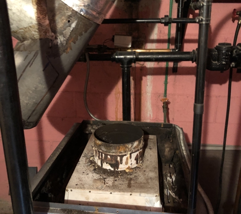 Mack Antonoff HVAC - Long Pond, PA. Dangerous sooted boiler left like this by a big name Heating Company.