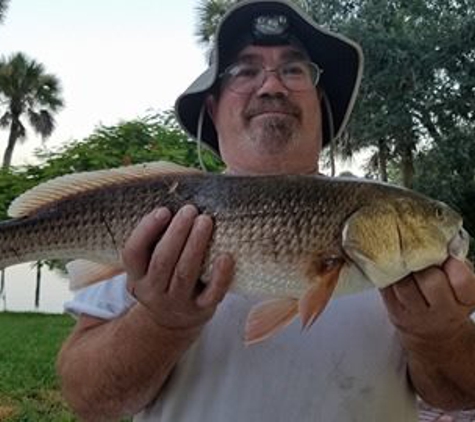 Aqua Time Pro Kayak Fishing Guides - Melbourne, FL. Nice Redfish caught by pro guide Robert Dillard in Elbow Creek a small tributary of the Eau Gallie River in Melbourne, Fl.