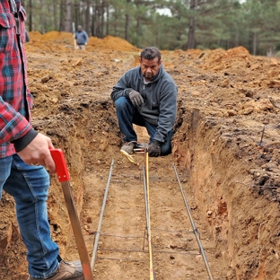 Four Oaks Residential - Four Oaks, NC. Laying out the steel placement for the footing.