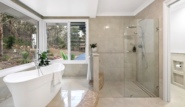 Bradnam's Windows & Doors - Urraween, QLD. Frameless Fixed Shower Screen