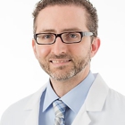 A. John Fakiris, MD