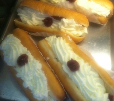 Arthur's Pastry Shop - Medford, MA. Old fashioned Bismarck .
Real whipped cream and raspberry filling.