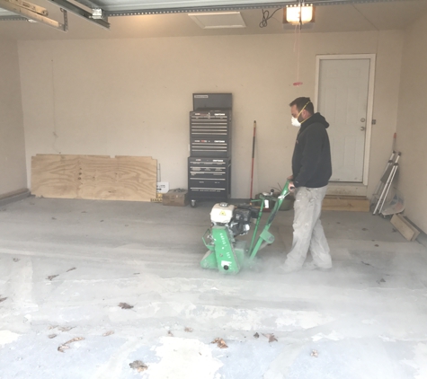 American Veteran General Contractors - Ellicott City, MD. Garage floor strip, level, crack removal