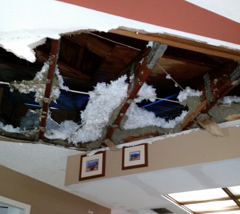 Nutech Roofing & Construction Inc - Largo, FL. looking up to my attic, which is now on my floor.