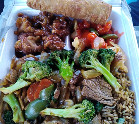 Ho Ho Chinese Restaurant - Forrest City, AR. This is the lunch buffet To Go Tray. I had Lo Mein, Fried Rice, BEEF and Broccoli, Fried Shrimp with Sweet and Sour Sauce and Chicken. It was pretty good. If you ever in the area stop by.
