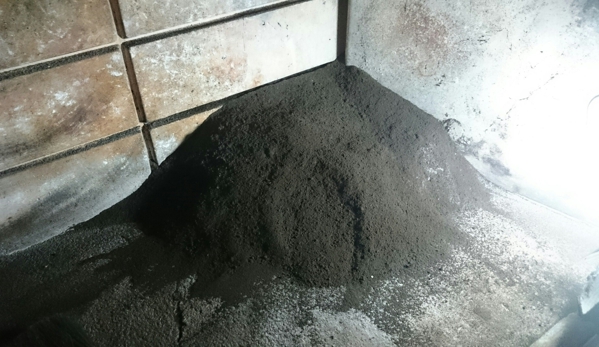 Joy Chimney Sweep, Fireplace & Dryer Vent Cleaning - Lakeland, FL. This fireplace was in a dangerous situation until Joy chimney sweep service came and cleaned it up and now it is safe.