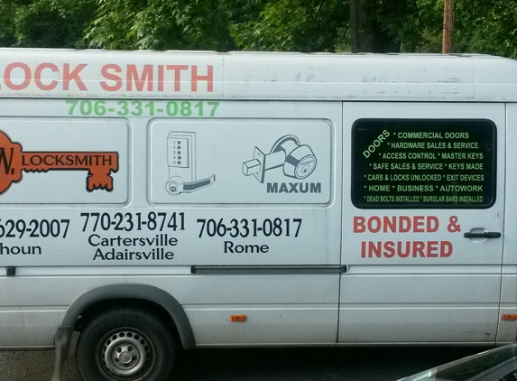 GW Locksmith Co.. If this truck don't show up on job site it's a scam locksmith call the police