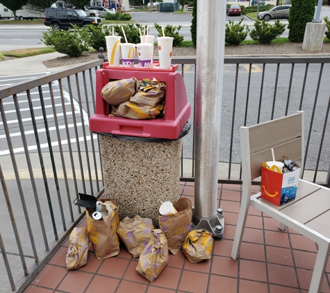 McDonald's - Hendersonville, NC. Management at this Hendersonville McDonald's advised that he "didn't have the help" to empty trash cans. If I were the manager, I would have emptied the can myself.