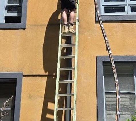 Ben Rafferty Air and Electrical. Getting the cable into the roof