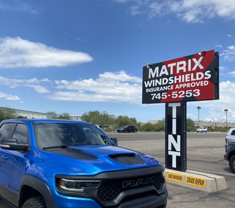 Matrix Auto Glass - Tucson, AZ. 2022 Ram TRX with factory windshield replacement and uv Kit ceramic with tint strip and calibration done right at our location.