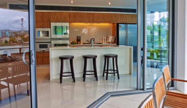 Bradnam's Windows & Doors - Ashmore, QLD. Ultra Silver Aluminium Corner Sliding Door