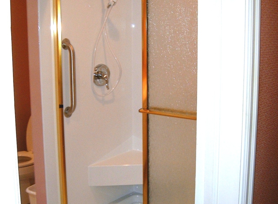 Best Fit Bath - Spokane, WA. Beautiful shower conversion with corner seat and bronze trim.