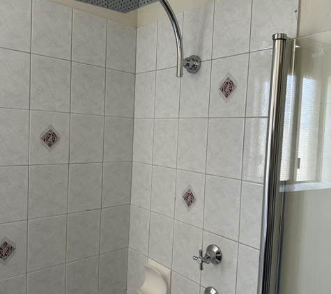 Casotti Plumbers Commercial & Domestic. Shower head and taps