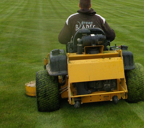 Green Blades - Nampa, ID. Green Blades employee doing lawn maintenance