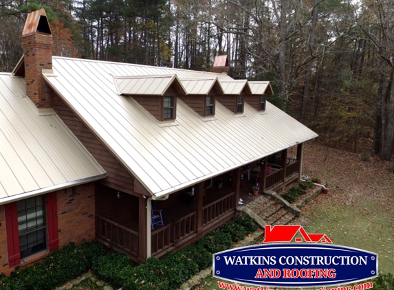 Watkins  Construction &  Roofing - Jackson, MS. Reeds Metals standing seam metal roofing system. The color is Mocha Tan. 