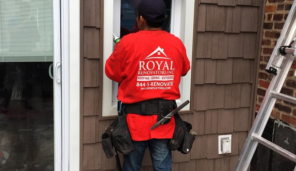 Royal Renovators Inc. - Forest Hills, NY. Royal Renovators Inc. - Vinyl siding installation in Brown color Cedar Shake style