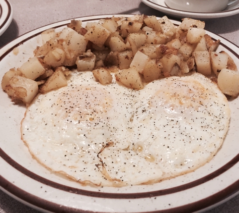 Blueberry Hill Family Restaurant - Las Vegas, NV. Eggs over medium with country potatoes!