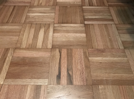 esr wood floors - san antonio, TX. Closet floor was properly sanded with 120 grit and properly finished, while the rest of the apartment was just cleaned and glazed.