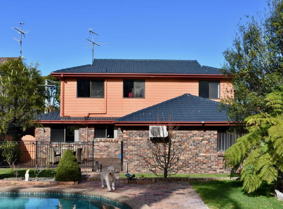 Total Roof Restoration - East Corrimal, NSW. Roof Restored, chimney gone.