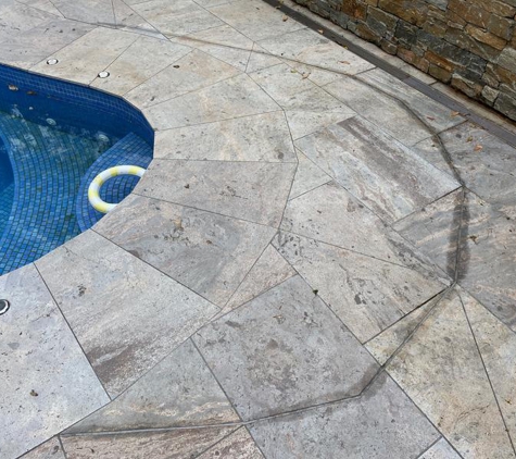 Mac con projects - West Ryde, NSW. Badly stained expansion joint around pool