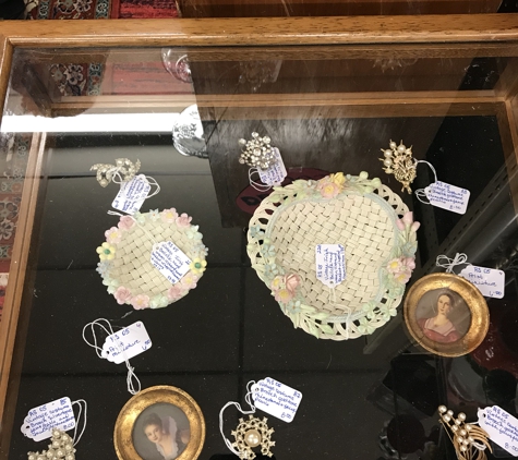 Apple Tree Antique Gallery - Bethany, OK. Multiple vintage brooches, vintage Irish Belleek 4 strand items.