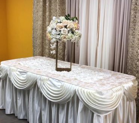 Rene's Fashion - Los Angeles, CA. Elegant table skirts with valance and backdrop for special events.