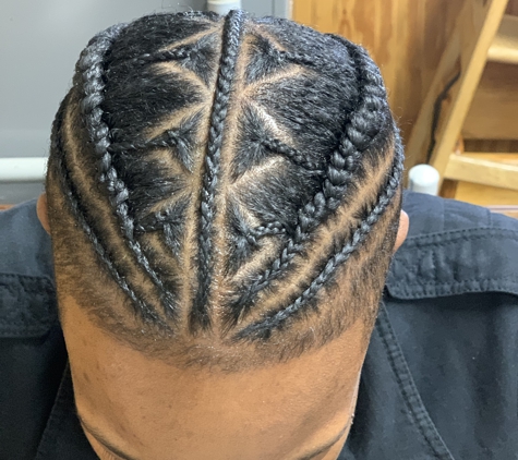 African Hair Braiding By Sankay - Tuscaloosa, AL. Man bun