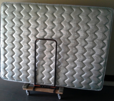 Powell Express Moving - Dubuque, IA. This is a mattress dolly, One of two ways we have to easily move any mattress.