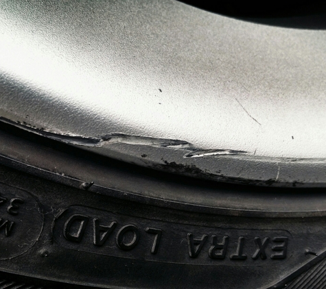 Chappell's Tires. Wheel damage cause by installation.