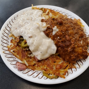 Waffle House - Hendersonville, NC. Bill Lewis of Vero Beach, Florida, making a quick stop at the Waffle House in Hendersonville, North Carolina.